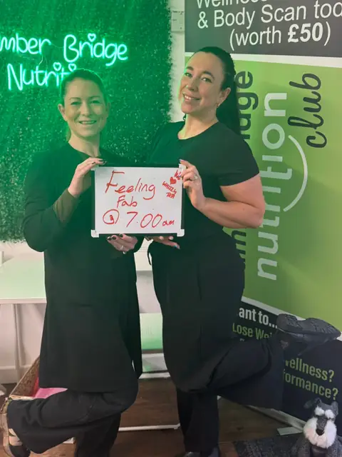 A Bamber Bridge Nutrition club member with her assessment board